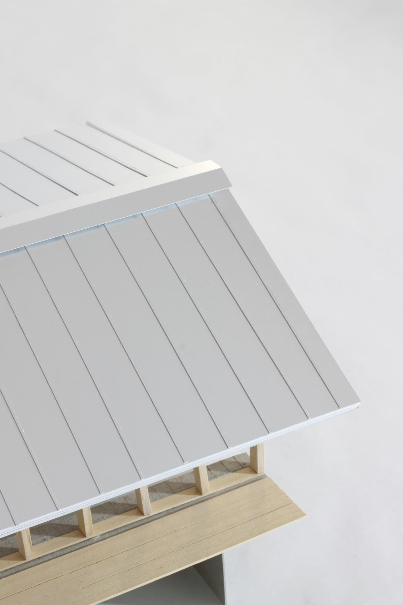 1:20 Model for a pool house in the landscape
